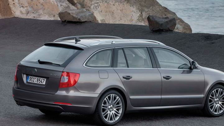 Side Back Pose Of Skoda Superb Combi Near Sea